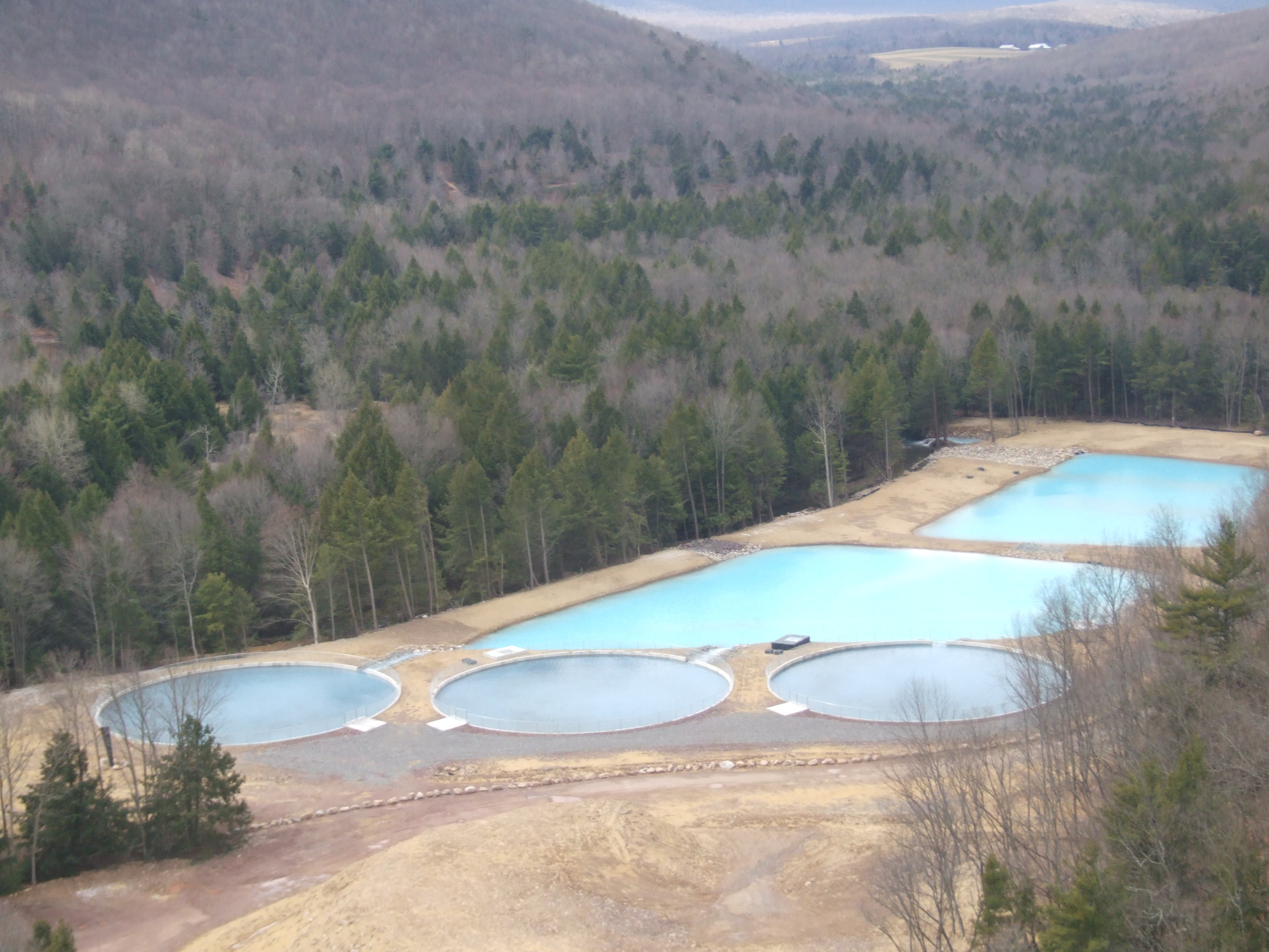 View of audenreid treatment system showing the three limestone tanks and two settling ponds.